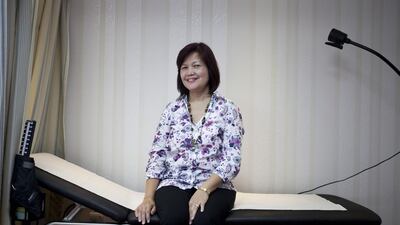 Efipania Balala had a good year in 2013 – she was given the all clear from cancer. “In 2014 I am hoping to have a good business and bring my children back to Abu Dhabi,” she says. Razan Alzayani / The National