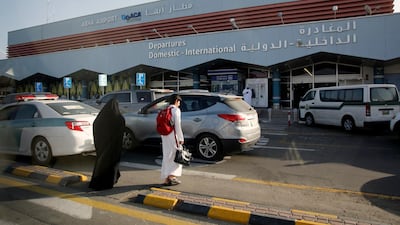 Saudi passengers enter the departure terminal of Abha airport in Saudi Arabia. AP Photo