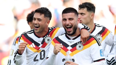 Deniz Undav, right, of Germany takes the plaudits after his two goals against Ivory Coast. AFP