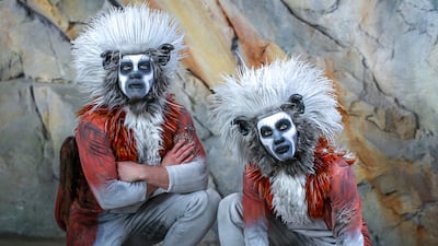 Ratcliffe and Lin Fan in full costume as cotton top-tamarins