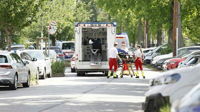 Emergency personnel near the scene of the attack. AFP