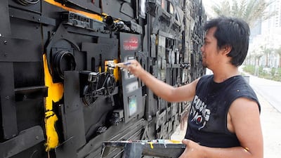 Darwin 'Japat' Guevarra, a highly regarded Filipino artist, creates a mixed media artwork that measures 9 meters by 3 meters. Japat painstakingly drew, cut out, rivited and painted each component which was then divided into seven parts and reconnected when put on display. The artwork was featured in the Outdoor Art Project 2012. Jeffrey E Biteng / The National