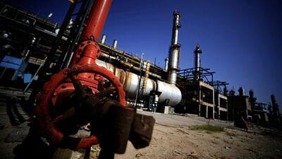 The Zawiya oil refinery, some 40 kms west of Tripoli. Oil prices fall as Muammar Qaddafi makes his last stand, and markets anticipate the potential release of lost Libyan output. AFP PHOTO / FILIPPO MONTEFORTE