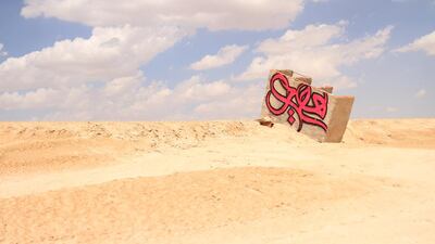 Photos of El Seed from his upcoming book, Lost Walls. This is in Tunisia. CREDIT: Courtesy El Seed