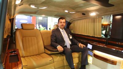 Savni Okcu, president of Okcu Individual Automotive Concepts, in one of his company’s vehicles at the Dubai International Motor Show. Pawan Singh / The National