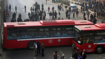 Relatives and residents block a road in Lahore, Pakistan to protest against killing of a family by counter-terrorism officers on January 20, 2019. AP Photo