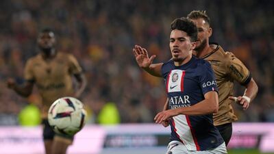 PSG's Vitinha chases the ball. AP Photo