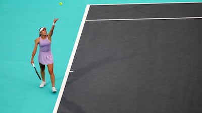 Ekaterina Alexandrova serves.