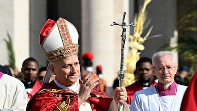 Pope Leo XIV arrives to lead a mass for Palm Sunday at St Peter's square in the Vatican. AFP