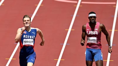Karsten Warholm of Norway and Rai Benjamin of the USA compete in the men's 400m hurdles final.