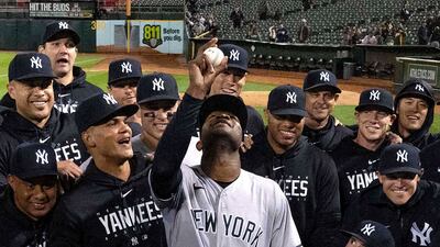 New York Yankees pitcher Domingo German poses with team-mates after pitching a perfect game against the Oakland Athletics at Oakland-Alameda County Coliseum. He retired every Oakland batter in an 11-0 victory. Reuters