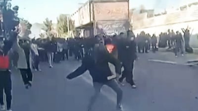 This grab taken on January 2, 2025, from UGC images posted on social media on December 31, 2025, shows protestors attacking a government building in Fasa, in southern Iran on December 31, amidst spontaneous nationwide protests driven by dissatisfaction at the country's economic stagnation. (Photo by UGC / AFP) / RESTRICTED TO EDITORIAL USE - MANDATORY CREDIT "AFP PHOTO / UGC / ANONYMOUS " - HANDOUT - NO MARKETING NO ADVERTISING CAMPAIGNS - DISTRIBUTED AS A SERVICE TO CLIENTS