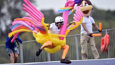 Aaron Eidelson flies the The Ballonaful Birman into the Yarra River during the Birdman Rally in Melbourne, Australia. The Birdman Rally is a charity competition for home-made gliders, hang gliders and human-powered aircraft. The first Moomba Birdman Rally was held in 1976. Julian Smith / EPA