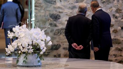 Mr Guterres and Turkish Foreign Minister Mevlut Cavusoglu stand together on the day of the deal signing in Istanbul. Reuters