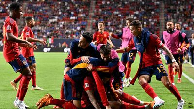 Spain players celebrate after Joselu's goal. AFP