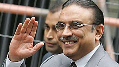 The Pakistan president, Asif Ali Zardari, waves as he arrives at 10 Downing Street in London, on Sept 16 2008, for a meeting with the British prime minister, Gordon Brown.