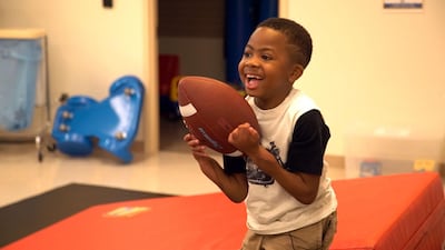 Zion Harvey, the first child in the world to undergo a double hand transplant is now able to write, feed and dress himself, doctors said on July 18, 2017, declaring the ground-breaking operation a success after 18 months. AFP PHOTO / Children's Hospital of Philadelphia