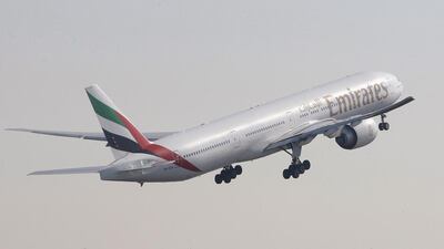 Rear seats are quietest on the Boeing 777 aircraft. Above, an Emirates airline 777-300 airplane takes off in Dubai. Nikhil Monteiro / Reuters