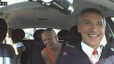 Norwegian Prime Minister Jens Stoltenberg (right) acting as a taxi driver in Oslo as a part of the election campaign for the Norwegian Labour Party.