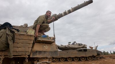 Israeli tanks outside the city of Sderot, near the border with Gaza. Getty Images