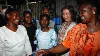 Queen Sofia of Spain meets residents during her visit to Mathare, Nairobi, during the Africa-Middle East Regional Microcredit Summit.