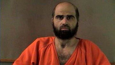 Nidal Hasan, in a police photo released in 2012. Reuters