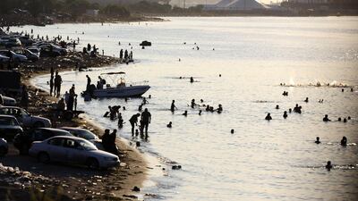 Libyans swim to cool off in the Mediterranean Sea on the Tripoli coast. AFP