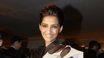 Sonam Kapoor in a polka dot sari by designer Masaba Gupta at Cannes 2011. Getty Images