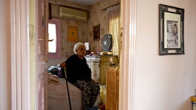 Houseboat owner Ikhlas Helmy, 88, sits in the bedroom of her houseboat. A government push to remove houseboats from Cairo’s Nile banks has cut the number from several dozen to just a handful. All photos by AP
