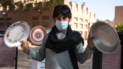 Various serving plates for the harees are also on display.