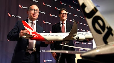 Qantas CEO Alan Joyce (L). AFP