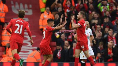Liverpool’s Philippe Coutinho celebrates scoring his team’s second goal. Paul Ellis / AFP