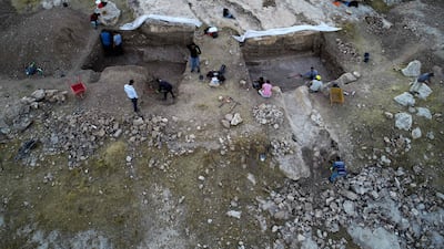 A team of Iraqi-Kurdish and Italian archaeologists excavate an ancient irrigation canal near Faydeh, in the Nineveh region.