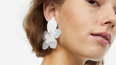 These metal drop white earrings give off serious Rihanna-at-the-Met-Gala vibes; Dh59 at H&M