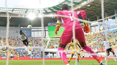 Ghana's forward Asamoah Gyan (L) Africa’s highest-scorer at the World Cup; starred at Al Ain before a modest spell at Al Ahli. AFP PHOTO / Justin TALLIS