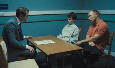 Mark Stanley, left, Owen Cooper and Stephen Graham in a scene from Adolescence. Photo: Netflix