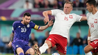 Poland's Kamil Glik tries to block a shot by Argentina's Lionel Messi during the Qatar 2020 World Cup final Group C match at Stadium 974. AP