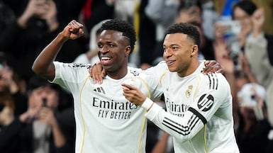 Kylian Mbappe, right, and Vinicius Junior, left, were both on target as Real Madrid ran riot over Monaco. Getty Images