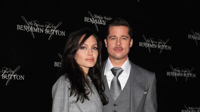 Brad Pitt, in Tom Ford, and Angelina Jolie attend 'The Curious Case of Benjamin Button' premiere on January 22, 2009 at Gaumont Marignan in Paris. Getty Images