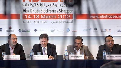From left, Salim Ziade, the general manager of HP; Antoine Georges, the managing director of Dome Exhibitions; Nilesh Khalkho, the chief executive of Sharaf DG; and Neelesh Bhatnagar, the chief executive of Emax, address a press conference on the Abu Dhabi Electronics Shopper. Silvia Razgova / The National