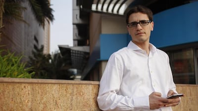Omar Khalaf saved himself Dh300 by shopping for his phone online instead of roaming the malls. Antonie Robertson / The National