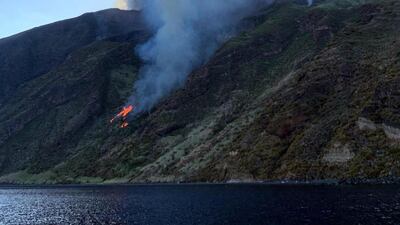 Ash rises into the sky after a volcano eruption on a small island of Stromboli, Italy. According to reports, the island of Stromboli was hit by a set of violent volcano eruptions spurring beach tourists to take into the sea. Two new lava spouts are creeping down the volcano. EPA