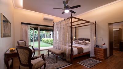 A four-poster bed in one of the retreat's 25 living spaces.