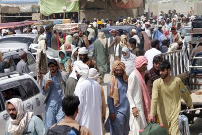 People arriving from Afghanistan gather at the Friendship Gate crossing point at the border town of Chaman, Pakistan. Reuters