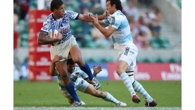 Samoa's Mikaele Pesamino, left, will provide a fillip for his country's chances of winning the Dubai Rugby Sevens. Steven Paston / Action Images