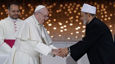 Pope Francis greets Dr Ahmad Al Tayeb, the Grand Imam of Al Azhar, after an inter-religious meeting at the Founder's Memorial in Abu Dhabi in February, 2019. AP