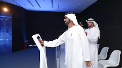 Sheikh Mohammed bin Rashid and Sheikh Hamdan bin Mohammed are given a tour of the Enterprise Command and Control Centre on Monday. Wam