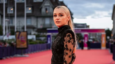 Rae DelBianco poses on the red carpet as she arrives to receive an homage during the 45th Deauville American Film Festival on September 11, 2019. AFP