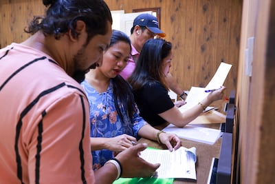 Filipino residents visit their embassy in Abu Dhabi. Victor Besa / The National
