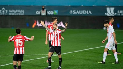 Athletic Bilbao's players celebrate after winning the Spanish Super Cup semi final. AFP